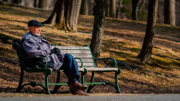 A middle aged man in soft morning light, contemplative