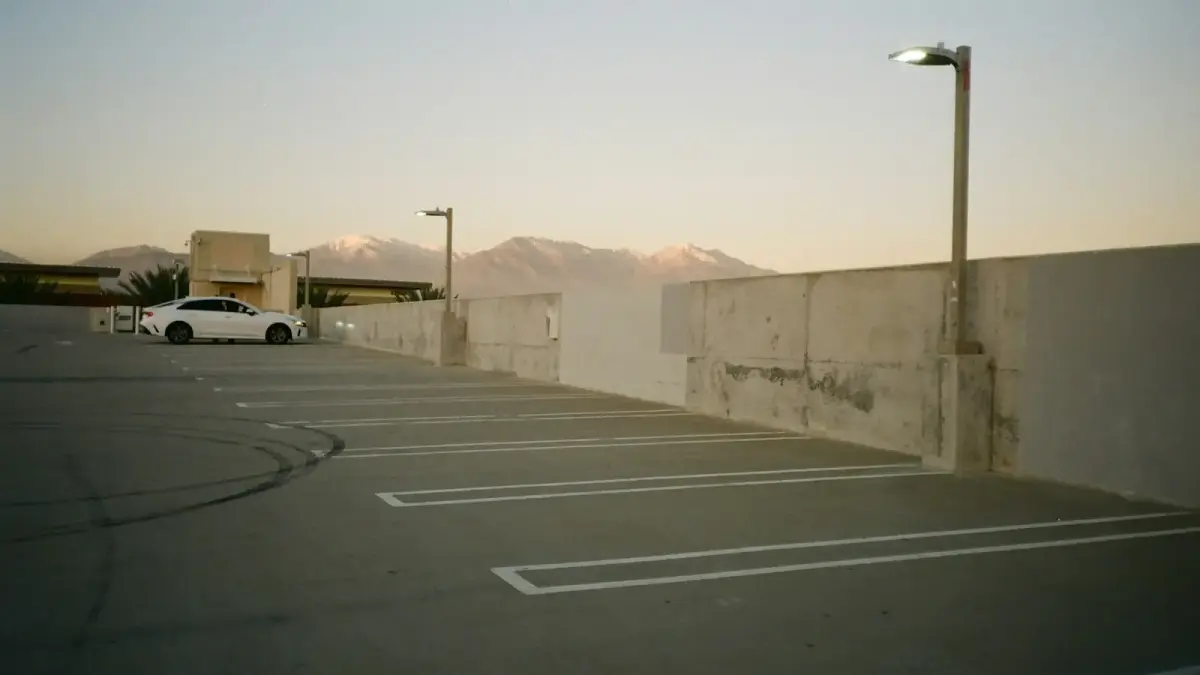 a white car parked in a parking lot