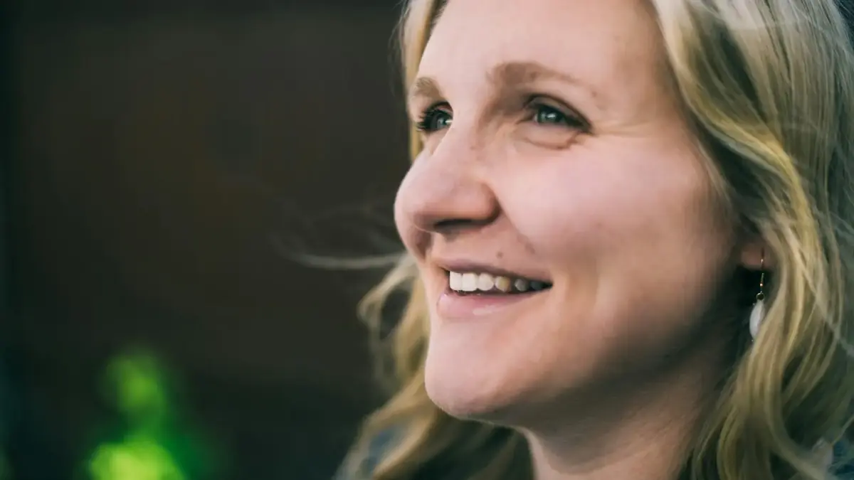 a close up of a person with a smile on their face