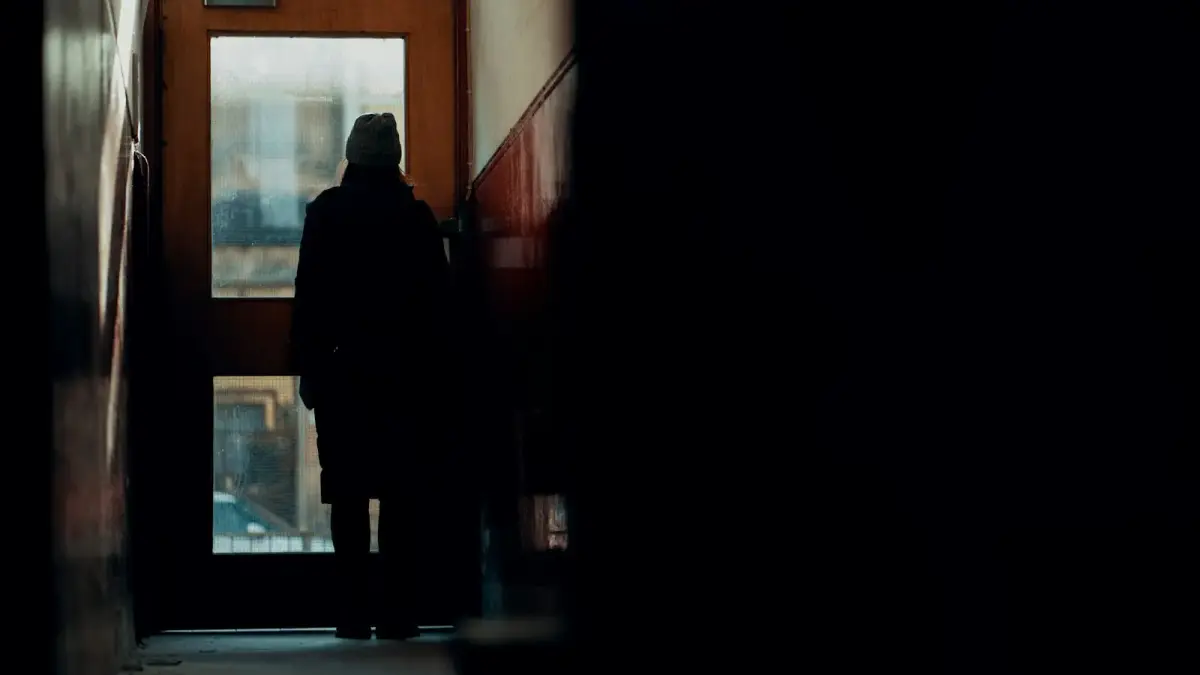 a person standing in front of a door