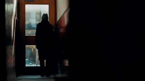 a person standing in front of a door
