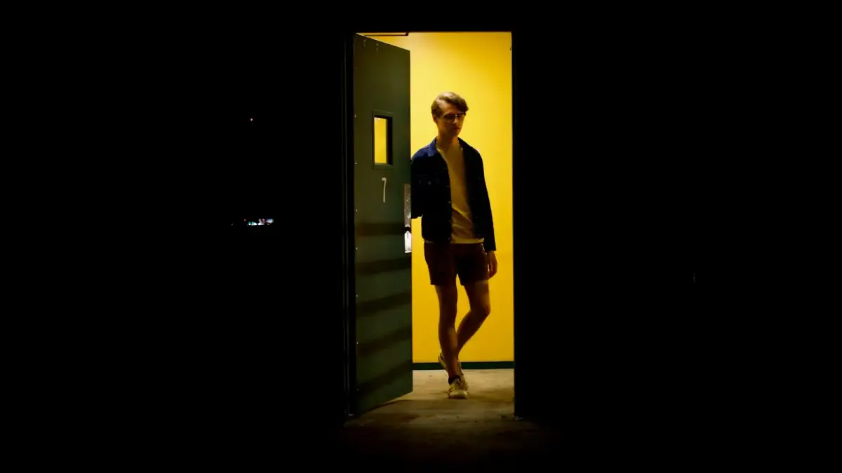 unknown person standing indoors