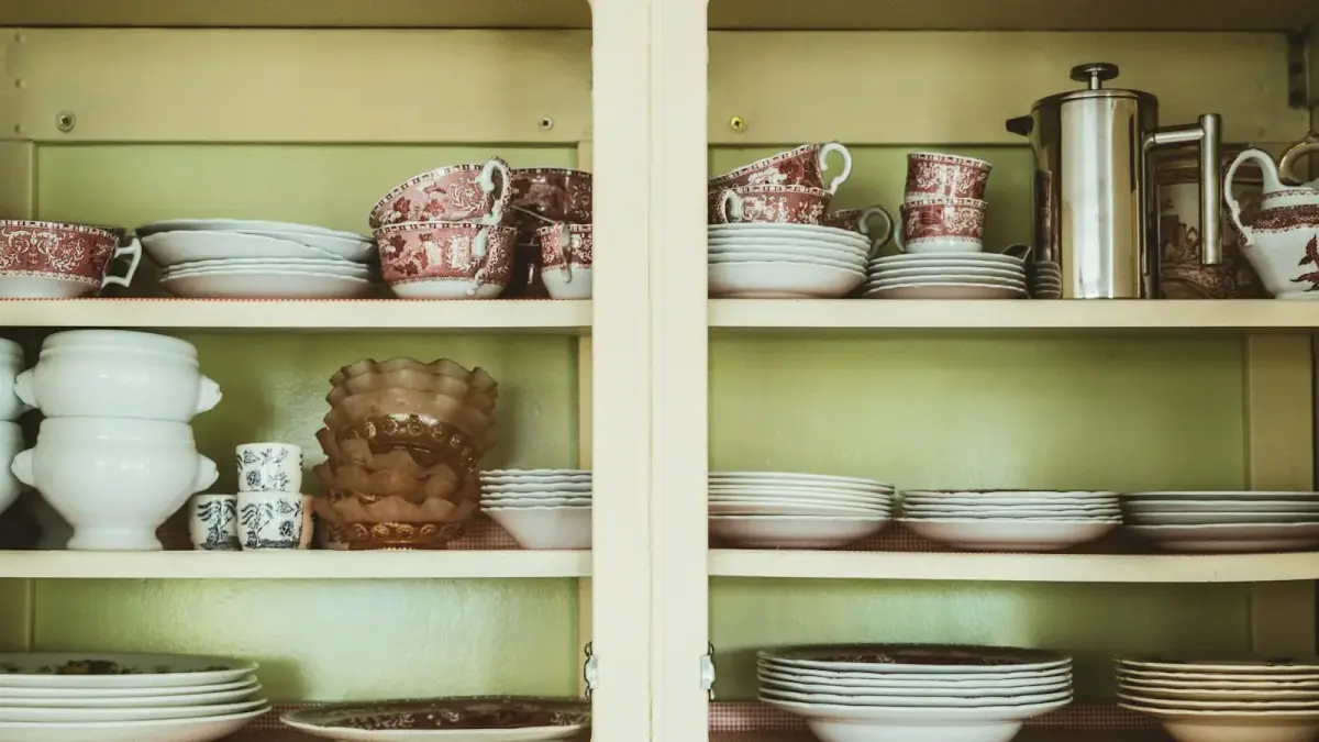 white ceramic bowl on brown wooden cabinet